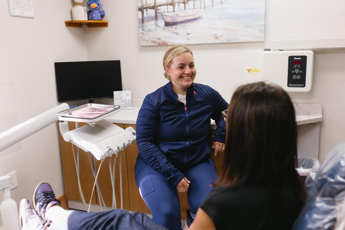 Dr. Bethany Taylor talking with a patient